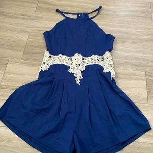Blue romper with lace/crochet detail